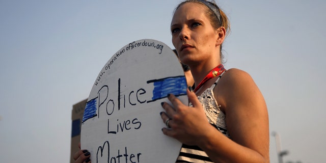 Sept. 1, 2015: A supporter of slain Fox Lake (Ill.) Police Lt. Charles Joseph Gliniewicz, Fox Lake, Illinois.