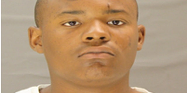 Keithan Kennard Manuel allegedly walked into a police station and told the dispatcher to hand over the station's money.