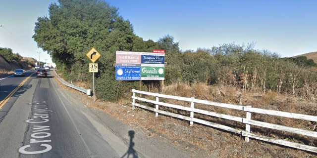 The fence and billboard the Tesla crashed through can be seen in this image from October 2017.
