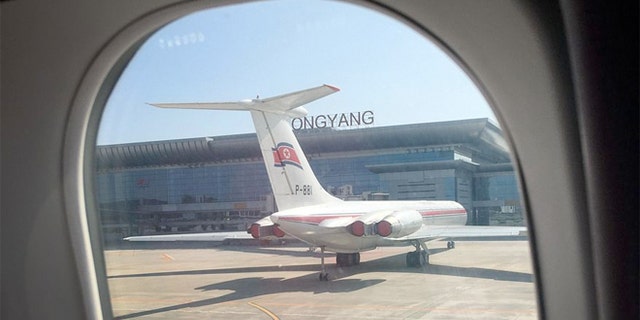 An Air Koryo plane sits on the tarmac in front of the new Pyongyang International Airport terminal building, in Pyongyang, North Korea.