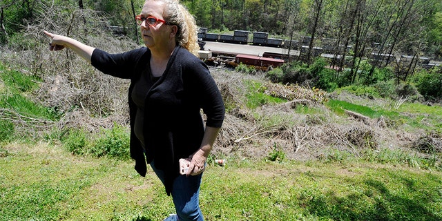 April 12, 2018: Mayor Heather Hall discusses the nearby train that was loaded with tons of sewage sludge that is stinking up her community of Parrish, Ala.