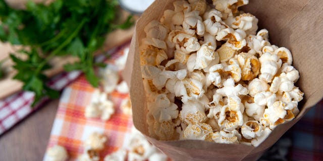 Looking for a more wholesome alternative for store-bought microwave popcorn? Just make your own in a paper bag.