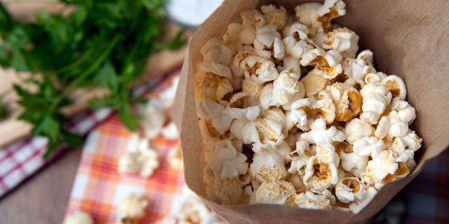 Looking for a more wholesome alternative for store-bought microwave popcorn? Just make your own in a paper bag.