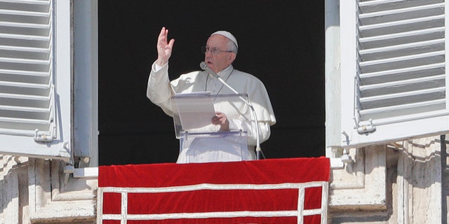 Feb. 4, 2018: Pope Francis delivers a blessing from his studio's window overlooking St. Peter's Square on the occasion of the Angelus noon prayer at the Vatican.