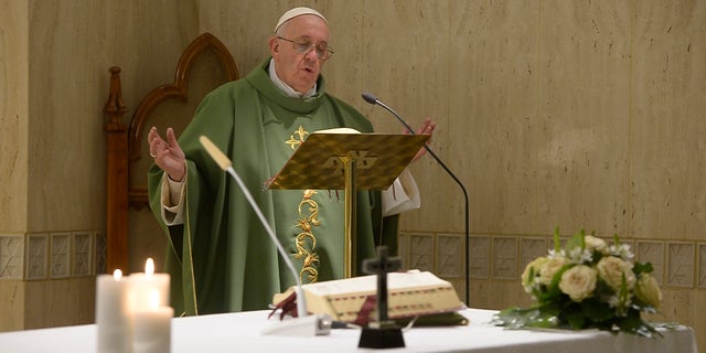 Pope Francis celebrates a mass at the Vatican's Santa Marta hotel, Friday, Nov. 6, 2015. The pontiff says it is "sad" when bishops and priests are "attached to money" and to advancing their careers, in his first public comments following the latest leaked revelations of greedy Vatican prelates resisting his efforts to reform Holy See finances and administration. Francis made the impromptu remarks during his homily Friday, apparently inspired by revelations in two new books of leaked documents and conversations. (L'Osservatore Romano/Pool photo via AP)