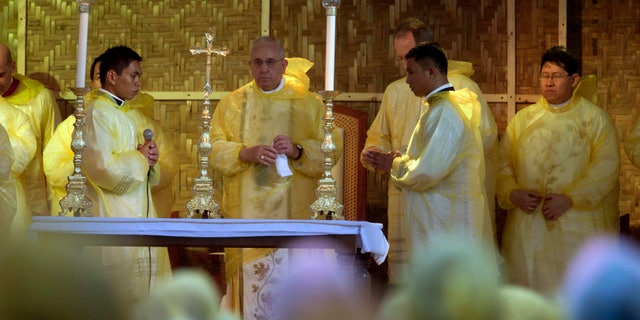 Jan. 17, 2015: Pope Francis, center, celebrates a mass in Tacloban, Philippines