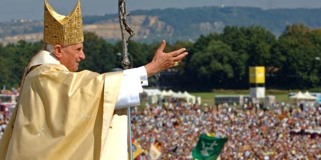 Pope Benedict XVI waves to the crowd at the end of a papal Mass Sept. 12, 2006 in Regensburg, southern Germany, about 75 miles northeast of Munich. 