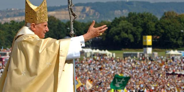Pope Benedict XVI waves to the crowd at the end of a papal Mass Sept. 12, 2006 in Regensburg, southern Germany, about 75 miles northeast of Munich.