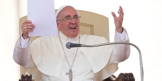 June 26, 2013: Pope Francis delivers his speech in St. Peter's square at the Vatican during his weekly general audience.