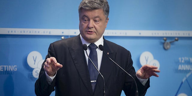 Ukrainian President Petro Poroshenko delivers a speech as he attends the 12th Yalta European Strategy Annual Meeting in Kiev, Ukraine, September 11, 2015. REUTERS/Ukrainian Presidential Press Service/Pool ATTENTION EDITORS - THIS IMAGE HAS BEEN SUPPLIED BY A THIRD PARTY. IT IS DISTRIBUTED, EXACTLY AS RECEIVED BY REUTERS, AS A SERVICE TO CLIENTS. FOR EDITORIAL USE ONLY. NOT FOR SALE FOR MARKETING OR ADVERTISING CAMPAIGNS. - GF10000201361