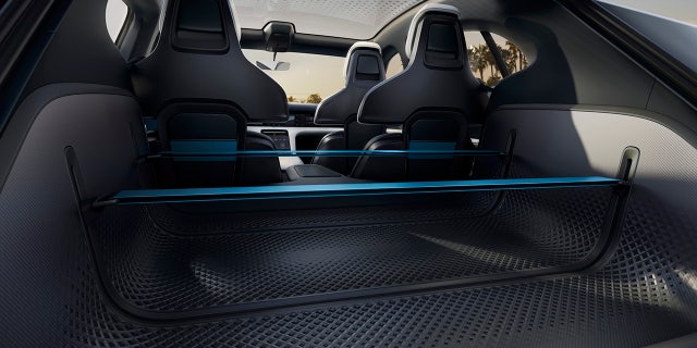 Adjustable straps in the cargo area can secure gear and create two load levels.