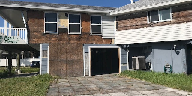 Candidates say continuity of representation is important in a district still recovering from Hurricane Harvey. This is one of dozens of damaged homes in Port Aransas, Texas.