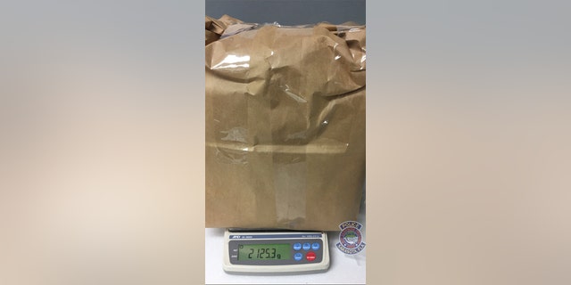 Thrift shop workers first found the tote, which contained the marijuana.