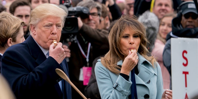 Image result for trump and melania blowing whistles