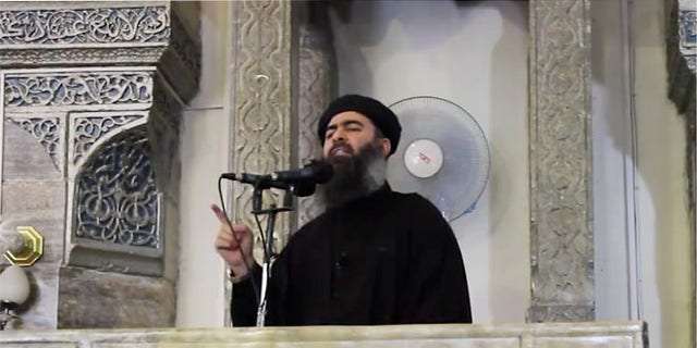 July 5, 2014: A video image on a militant website purporting to show Islamic State group leader Abu Bakr al-Baghdadi at a mosque in Iraq.