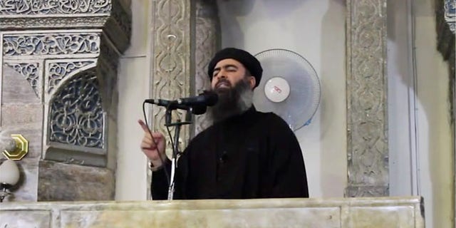 July 5, 2014: A video image on a militant website purporting to show Islamic State group leader Abu Bakr al-Baghdadi at a mosque in Iraq.
