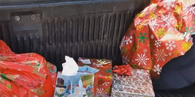 A woman spotted Christmas presents on the side of a Florida highway and wants to return them to the owner.