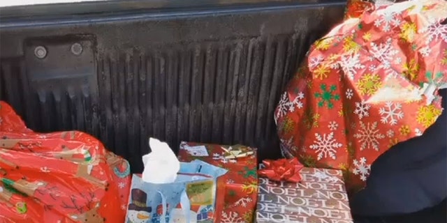 A woman spotted Christmas presents on the side of a Florida highway and wants to return them to the owner.