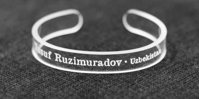 This handout photo provided by the Press Uncuffed Campaign shows a bracelet that University of Maryland journalism students are selling emblazoned with the names of journalists imprisoned around the world.