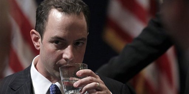Reince Priebus takes a drink of water after winning the chairmanship during the Republican National Committee Winter Meeting Jan. 14 in Oxon Hill, Md.