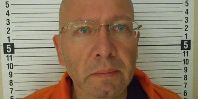 Father Kevin Gugliatta was sentenced Thursday to up to two years in prison after child porn was found on his computer.