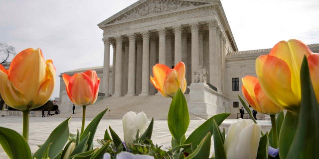 The Supreme Court is seen in Washington, Monday, April 4, 2016, after justices ruled in a case involving the constitutional principle of âone person, one voteâ and unanimously upheld a Texas law that counts everyone, not just eligible voters, in deciding how to draw legislative districts. (AP Photo/J. Scott Applewhite)