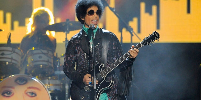 In this May 19, 2013, file photo, Prince performs at the Billboard Music Awards at the MGM Grand Garden Arena in Las Vegas.