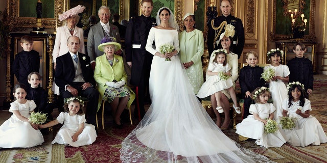 Prince Harry and Meghan Markle posed for their official wedding portrait in Windsor Castle.