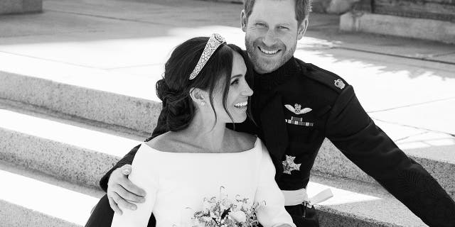 Britain's Prince Harry and Meghan Markle, on the East Terrace of Windsor Castle, Windsor, England, Saturday May 19, 2018.
