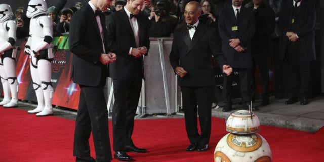 The tuxedo-clad princes walked the red carpet at London’s Royal Albert Hall for the film's premiere in London on Tuesday.