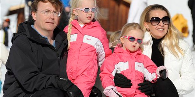 Feb. 19, 2011: In this file photo Netherland's Prince Friso, left, and his wife Princess Mabel, right, pose with their daughters Luana and Zaria for photographers during a photo session in the Austrian skiing resort of Lech.