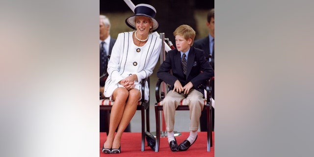 File photo - The Princess of Wales and Prince Harry attend VJ (Victory over Japan) Day ceremonies in the Mall Aug. 19, 1995. (Reuters).