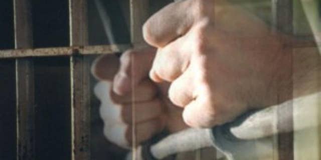 Prison bars AP