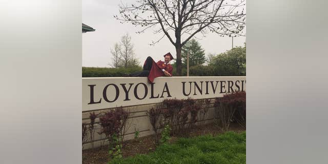MAy 15, 2016: Andrey Privin after graduating from Loyola University.
