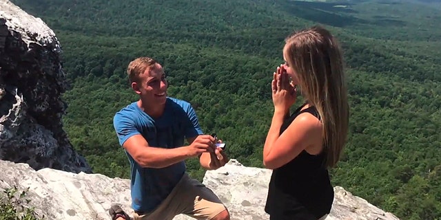 Hunter Sawyers proposed to his girlfriend, Elaina Bullard, with a picture-perfect backdrop during Monday's total solar eclipse.