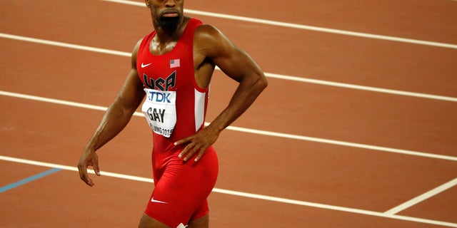 Tyson Gay leaves the track after an events at the World Athletics Championships in 2015.