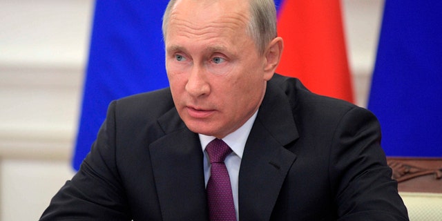 Russian President Vladimir Putin chairs a meeting on the development of transport infrastructure in Kaliningrad, Russia, Wednesday, Aug. 16, 2017. (Alexei Druzhinin, Sputnik/Kremlin Pool Photo via AP)