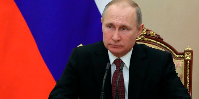 Russian President Vladimir Putin chairs a Security Council meeting in Moscow, Russia.