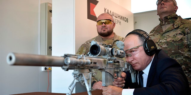 The Kremlin claims Putin was able to hit targets 1,968 feet away.