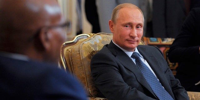 Aug 28, 2014: Russian President Vladimir Putin, right, meets with South African President Jacob Zuma in the Novo-Ogaryovo residence outside Moscow, Russia. (AP)