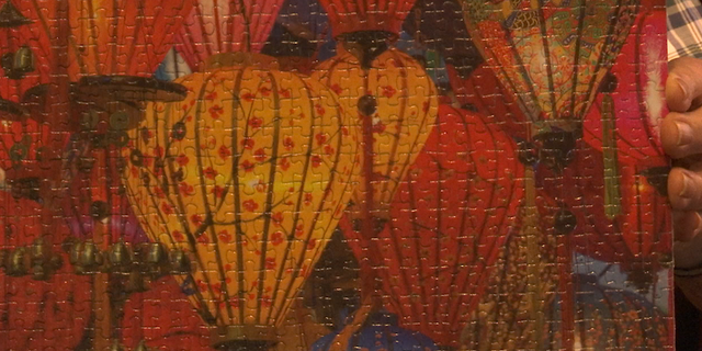 David Butler has solved a variety of different puzzle designs including a scene of lanterns.