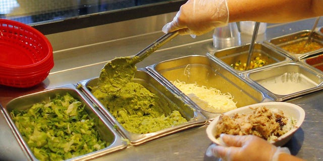 A carnitas burrito bowl gets the works at Chipotle.