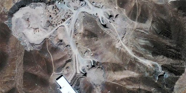 Sept. 26, 2009: This satellite image provided by GeoEye shows a facility inside a mountain outside of Qom, Iran.