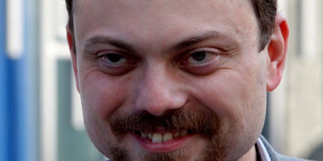 Russian opposition activist Vladimir Kara-Murza looks on following a visit of deputy candidates to the State Duma, the lower house of parliament