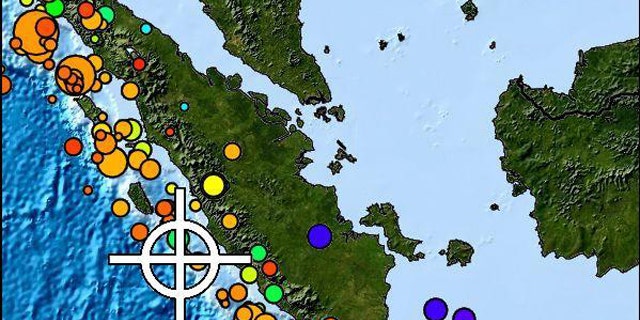 Circles indicate the magnitude and colors indicate the depth of earthquakes off the coast of Indonesia in this NOAA map. Red colors indicate shallower quakes, while green through purple indicate deeper quakes less likely to lead to a tsunami.