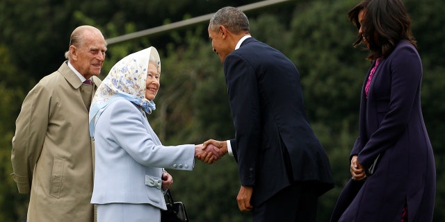 President Barack Obama and first lady Michelle Obama are greeted by Queen Elizabeth II and Prince Philip, Duke of Edinburgh upon their arrival for lunch at Windsor Castle in Windsor, Britain April 22, 2016.