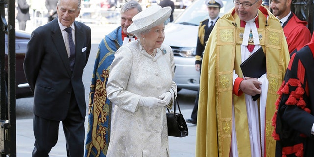 June 4, 2013: Britain's Queen Elizabeth II and her husband Prince Philip, left, arrive for service to celebrate the Queen's 60th anniversary of her coronation at Westminster Abbey, escorted by The Dean of the Abbey Dr John Hall in London.