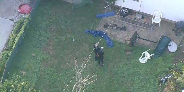 The suspected burglar was found with head trauma and stab wounds, police said.