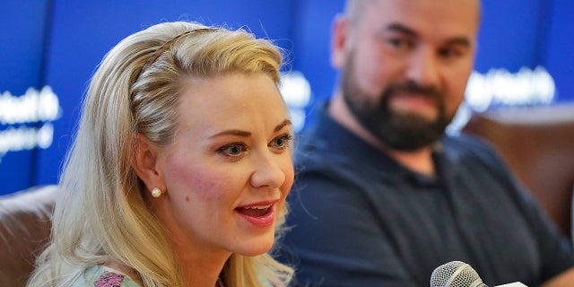 Jamie Scott speaks accompanied by her husband, Skyler, during a news conference at St. Joseph’s Hospital and Medical Center in Phoenix on Friday, April 6, 2018. Jamie gave birth to quintuplets on March 21, 2018.