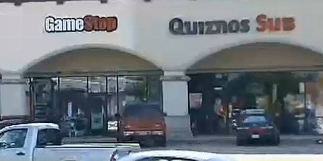 A Marine veteran taking in lunch break fatally shot a suspected robber Thursday at a video game store in Houston.